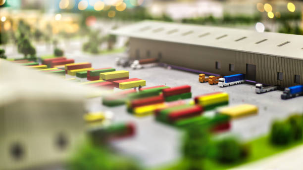 istock toy trucks in a parking space ready for delivery from warehouses 1202129544