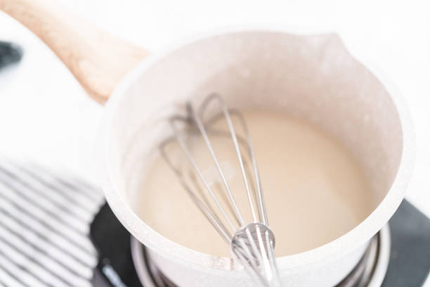 istock Making homemade caramel from scratch in a small saucepan. 1202129619