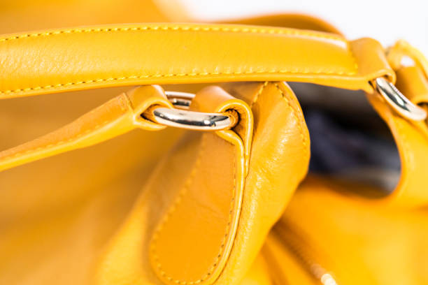 istock Womens yellow bag on a white background. 1202130468
