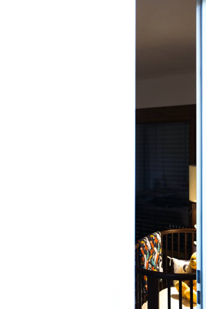 istock A look into the children’s room through a half open door. 1202134035