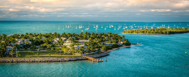 Key West, Florida Keys, USA Panoramic sunrise landscape view of the small Islands Sunset Key and Wisteria Island of the Island of Key West, Florida Keys. small florida home stock pictures, royalty-free photos & images