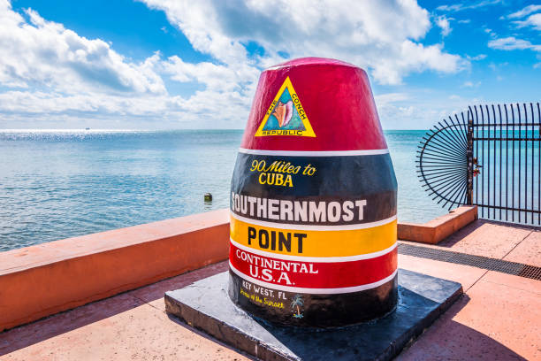 key west, florida. colorful buoy and famous landmark of the southernmost point of the usa. - key west imagens e fotografias de stock