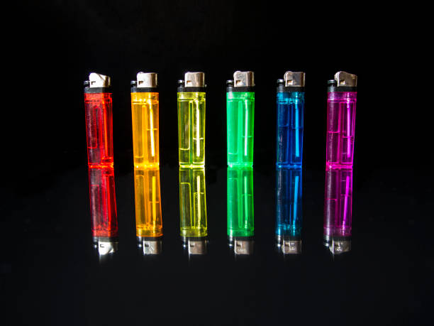 istock LGBT flag colors lighter on black background with refection 1202136425