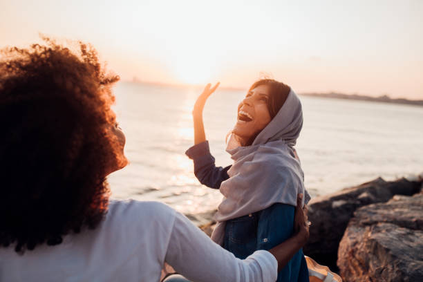 Girls enjoying a sunset