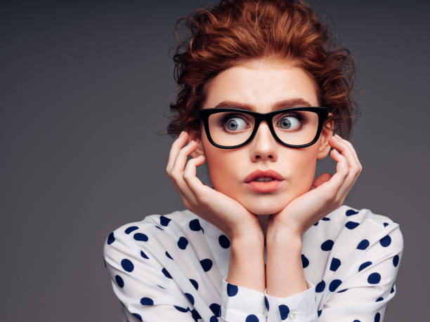 istock Beautiful girl with eyeglasses 1202137829