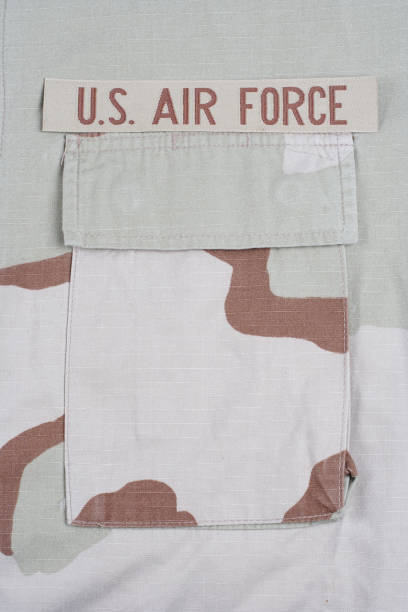 istock US AIR FORCE branch tape on desert camouflage uniform background 1202139916