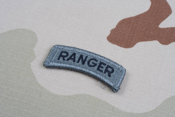 istock US ARMY ranger tab on camouflage uniform 1202140106