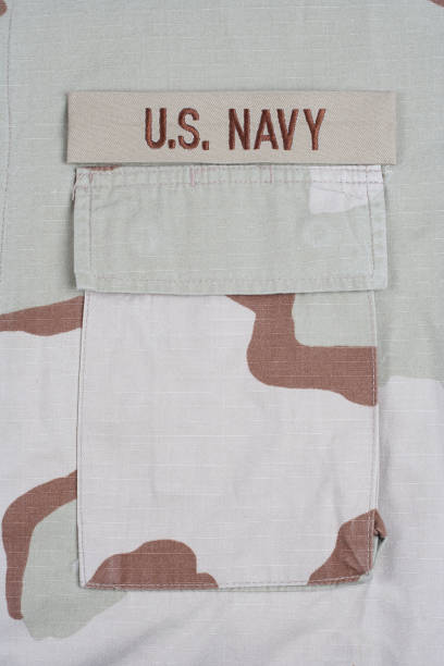 istock US NAVY branch tape on desert camouflage uniform 1202140176
