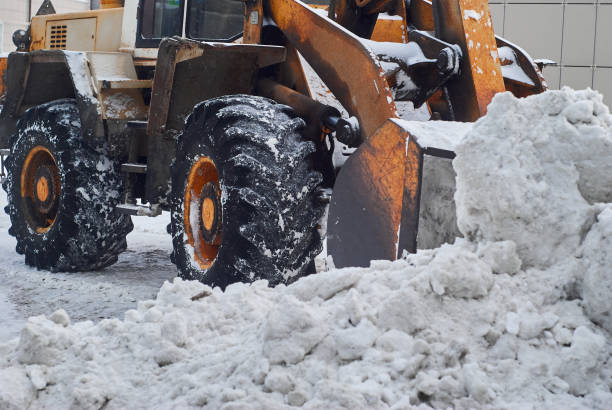 istock loader bucket removing  snowdrift close up