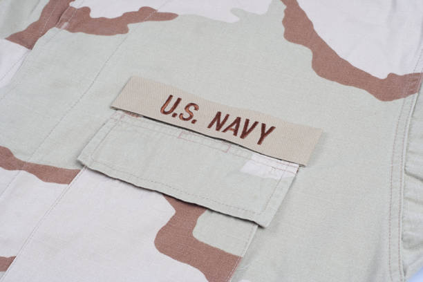 istock US NAVY branch tape on desert camouflage uniform 1202140357