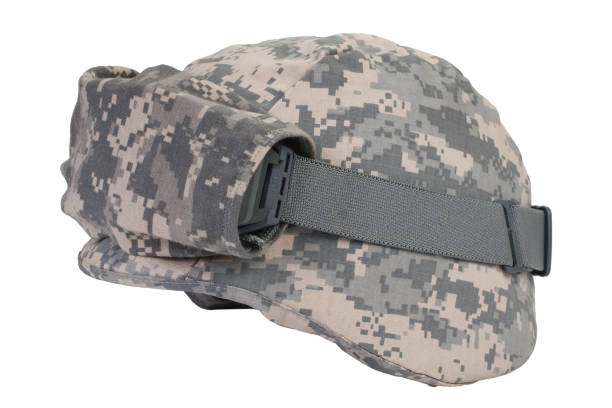 kevlar helmet with a camouflage cover and protective goggles