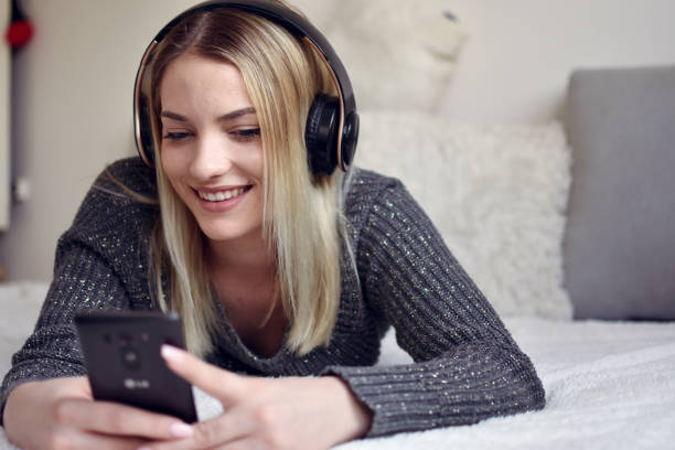 istock Happy girl listening 1202141469
