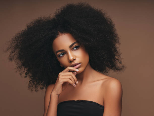 istock Beautiful girl with curly hairstyle 1202144035