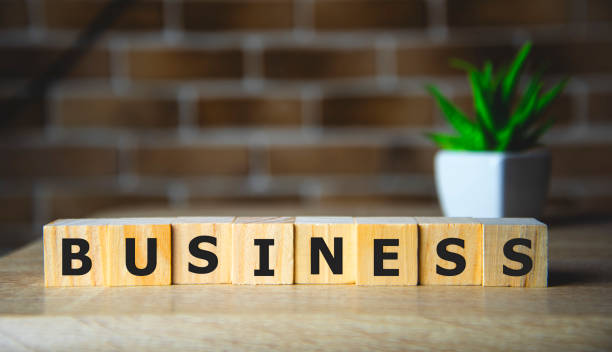 istock business - word on wodden blocks, business creative motivation concept. 1202145139