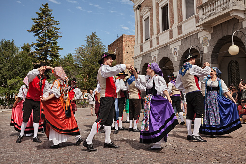 Italian folk dancers Danzerini di Lucinico from Friuli Venezia Giulia perform traditional dance at International Folklore Festival on August 4, 2013 in Russi, RA, Italy