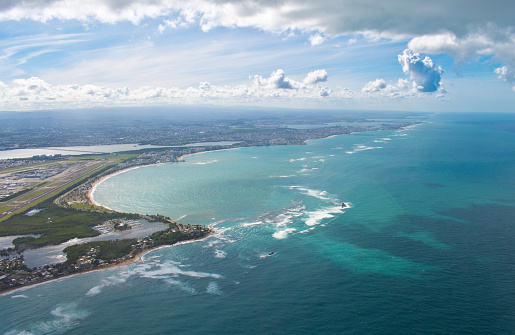 Puerto Rico from the sky plane window coast line San Juan tropical ocean