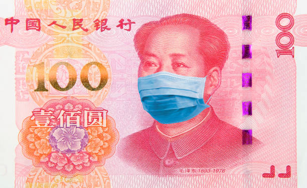 Coronavirus Wuhan Sars illness. Concept: Quarantine in China, 100 Yuan banknote with face mask. Digital montage. stock photo