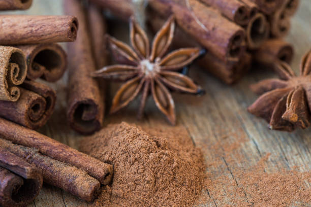 istock Anice star and cinnamon. Toned photo. Closeup. Top view 1202149882