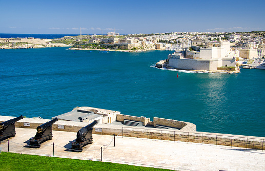 Saluting Battery of Cannons at the Fort Lascaris St. Angelo of La Vittoriosa upper Barrakka gardens view to the port and Grand Harbor of Valletta, Malta