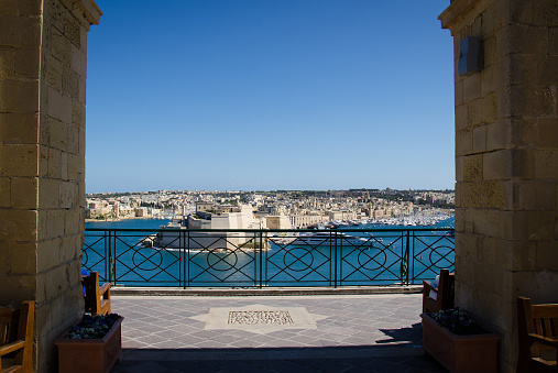 View of L-Isla peninsula, port and Grand Harbor of Valletta from Saluting Battery at the Fort Lascaris St. Angelo of La Vittoriosa upper Barrakka gardens, Malta