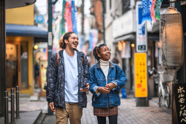 istock Young and Carefree Mixed-Ethnic Couple Exploring Tokyo 1202154744