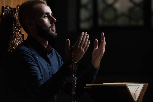 istock Muslim Man Is Reading The Koran 1202158819