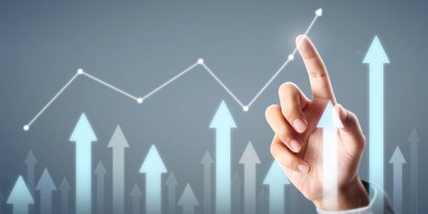 istock Businessman plan graph growth and increase of chart positive indicators 1202164733