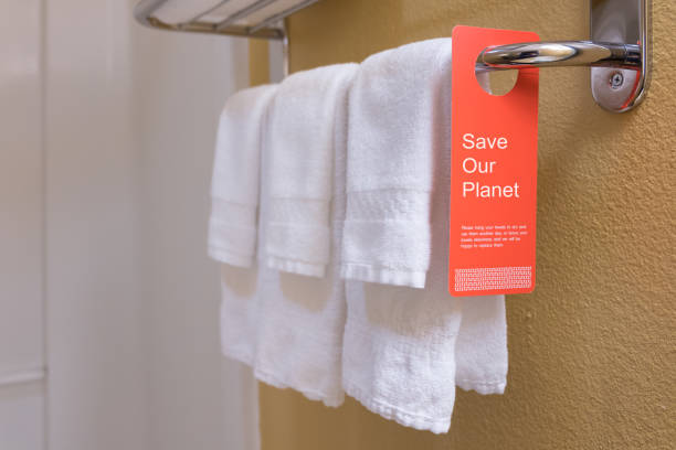 Save our water label Save water sign label on hotel encourage guest reuse bath towel guest bathroom stock pictures, royalty-free photos & images