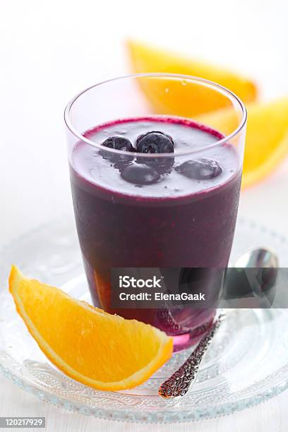 Smoothie With Blueberries Cranberries And Orange Juice Stock Photo - Download Image Now