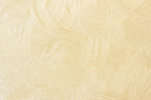 Dormitorio de pared de diseño o sala de recepción decorada con un fondo de textura de papel pintado. Tono abstracto de papel alfombra color beige suave, sepia y con crema rústica. Tejido de patrón vintage y superficie de la tarjeta. photo