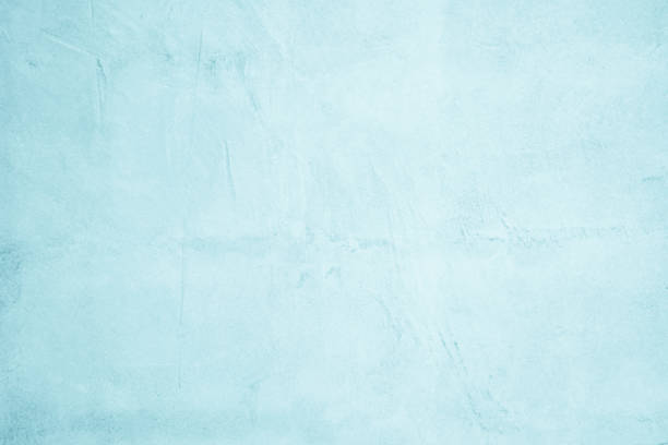 istock Pastel Blue and White concrete stone texture for background in summer wallpaper. Cement and sand wall of tone vintage. Concrete abstract wall of light blue color, cement texture background for design. 1202181088