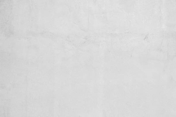 istock White concrete wall for interior or outdoor exposed surface polished. Cement have sand and stone of tone vintage, Grey natural concrete loft patterns old antique, design work floor texture background. 1202181089
