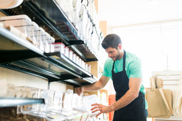 istock Male Owner Working In Grocery Store 1202182208