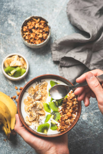 istock Healthy fruit granola bowl with yogurt 1202184850