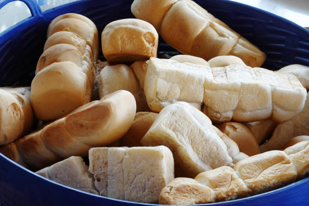 istock Bread in the basket for selling to be used for feeding fish. 1202186135