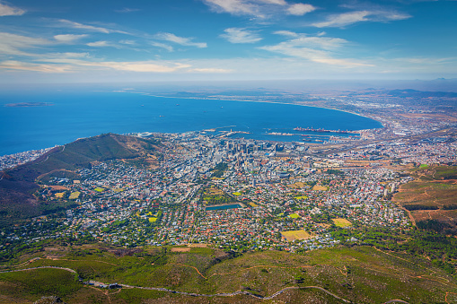 View towards the city of Cape Town in Summer from Table Mountain Viewpoint. View over famous Signal Hill, Lion`s Head, the Gardens, Oranjezicht and Vredehoek Districts towards the Cape Town Waterfront and Harbor at the Atlantic Ocean. Cape Town, Western Cape, South Africa, Africa