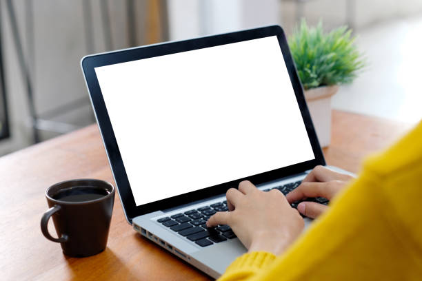istock Laptop mock up, Woman hands typing computer with blank screen for template background, Laptop with blank screen backdrop for people and business, e commerce,  technology , online education, e learning, and internet of things 1202191492