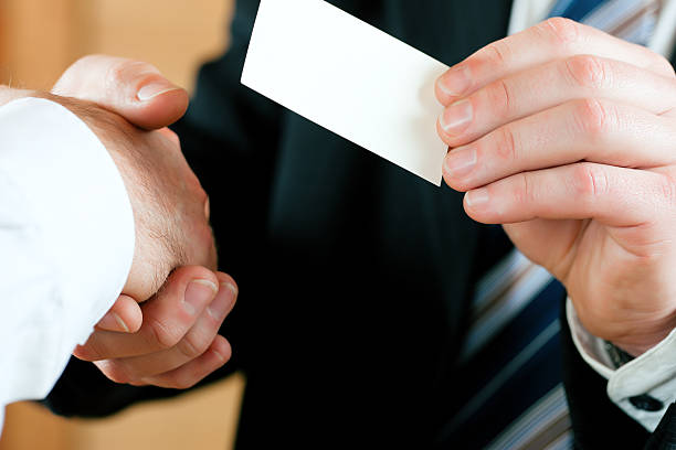 istock Businessman handing over business card 120219749
