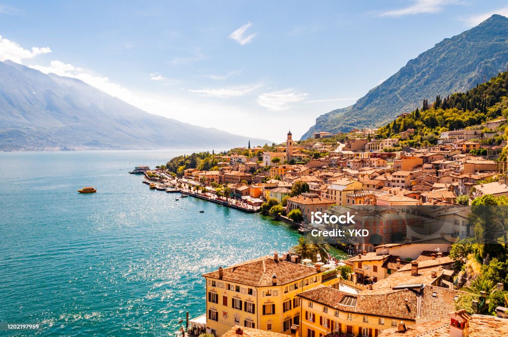 Limone Sul Garda cityscape on the shore of Garda lake surrounded by scenic Northern Italian nature. Amazing Italian cities of Lombardy Limone Sul Garda cityscape on the shore of Garda lake surrounded by scenic Northern Italian nature. Amazing Italian cities Lake Garda Stock Photo