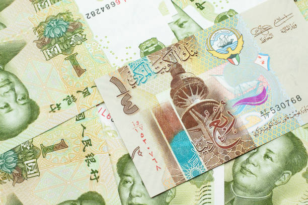 istock A dinar bank note from Kuwait with Chinese one yuan bills 1202198184