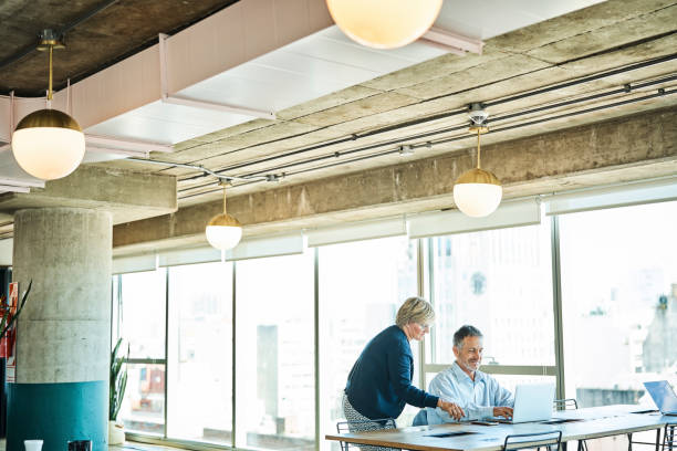istock Entrepreneurs discussing in coworking office 1202214691