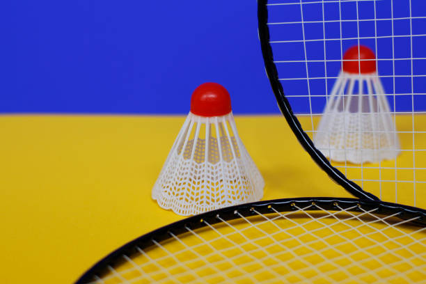 istock Badminton. Two shuttlecocks and two badminton racket. 1202214726