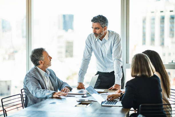 istock Entrepreneurs discussing in meeting at office 1202215405