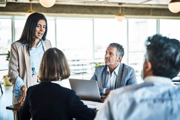 istock Entrepreneurs discussing at coworking space 1202215507