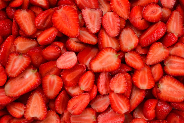 istock Strawberry slices. Fresh berries macro. Fruit background. Top view. 1202216005