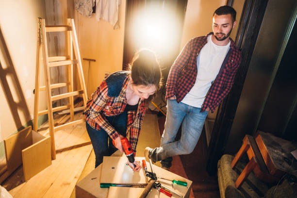 istock Young couple renovating their new home 1202217737