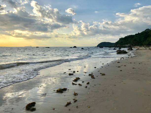 istock Setting sun on island beach, Thailand 1202218774