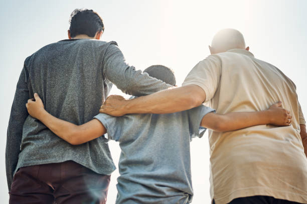 istock Rear view of multi-generation family against sky 1202219913