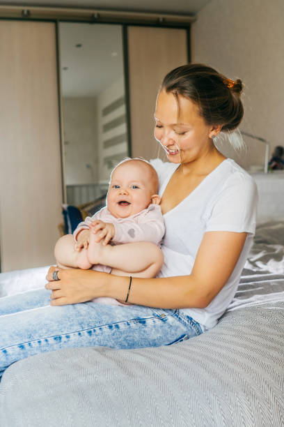 istock Happy young mother with baby. 1202221804