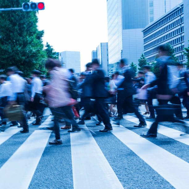 istock Tokyo Busy Crosswalk Scene With Blur Motion 1202222503